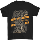 a black t - shirt with an orange and black design