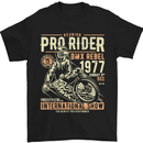 a black t - shirt with an image of a man riding a motorcycle